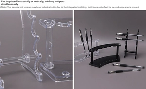 Dual-orientation acrylic pen holder with 6 slots shown in clear and black finishes