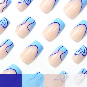French blue and nude square press-on nails with heart patterns and abstract line designs