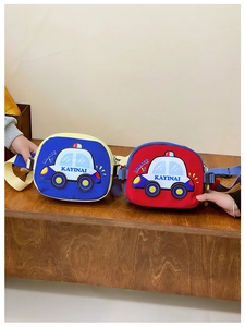 Detail view of cartoon car waist bags in blue and red with adjustable straps for kids