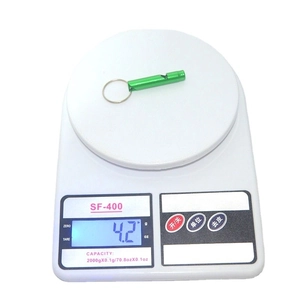 Portable green aluminum alloy survival whistle with keychain weighing only 4.2g