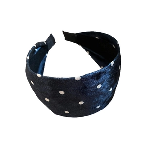 Classic wide headband in dark velvet with white polka dots for a vintage fashion style