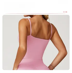 Detailed back view of pink yoga sports bra with thin straps and hollow square back design