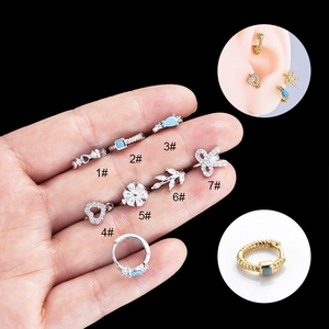 Set of 7 silver zircon bow and heart stud earrings with diverse geometric nature designs