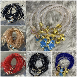 Hamsa Hand and Evil Eye crystal bead bracelets in multiple colors for women
