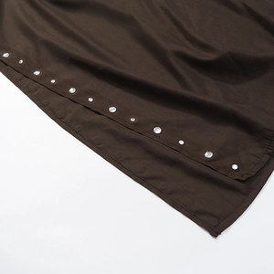Bohemian loose top with scarf collar and metal snap buttons on the side hem detail
