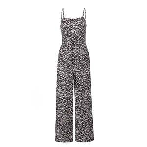Detail view of leopard print texture and spaghetti strap on the backless wide leg jumpsuit