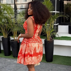 Women sleeveless A-line dress with red and beige tie-dye print and cinched waist