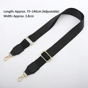Tracolla regolabile in nylon nero da 3,8cm con fibbie dorate e dettagli in pelle