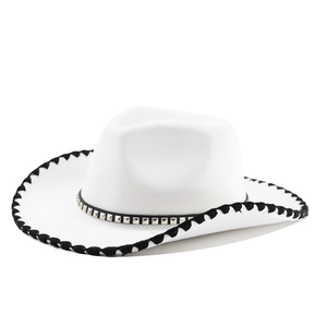 Macro detail of white felt cowboy hat with rivet leather belt and woven edge