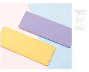 Slim leather card holder showing precise edge stitching in yellow and purple colors