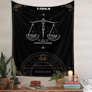 Detail of black Libra zodiac wall tapestry with white sunburst and constellation art
