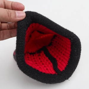 Winter knitted beanie for children featuring warm double-layer black and red contrast design