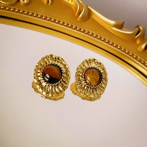 Vintage gold stud earrings with oval tiger eye stones and Maillard style aesthetic