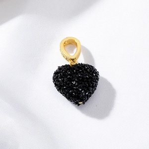 Elegant heart-shaped black textured pendant with a gold-plated crystal-set bail for DIY jewelry