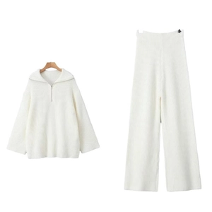 Women's white knitted two-piece set with half-zip sweater and wide-leg trousers