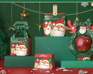Detailed view of red and green Christmas gift boxes with Merry Christmas ribbon and 3D design