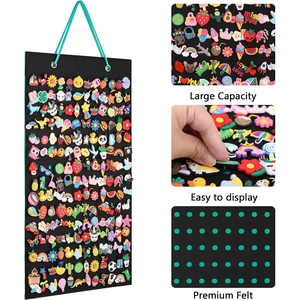 Detail of the large capacity felt hanging wall rack for shoe charms and badge storage
