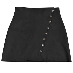 Detail view of the black suede mini skirt featuring decorative metal snap buttons and wave trim