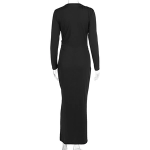 Detailed back view of women's black slim fit dress featuring side ruched pleated details