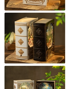 Close-up of decorative Christmas book snow globe lanterns with glowing LED snowy winter scenes