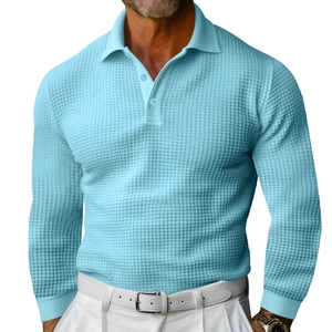 Light blue men's waffle knit long sleeve polo shirt featuring a classic buttoned lapel