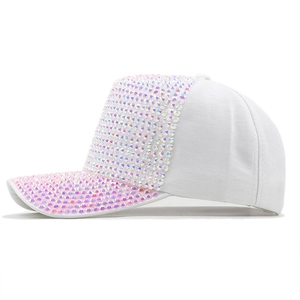 Close-up of sparkling colorful rhinestones on a white cotton baseball cap visor