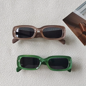 Retro rectangular sunglasses with translucent frames and silver B logo detail