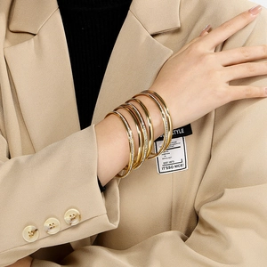 Chic 5.5mm gold stackable bangle set with pavé cubic zirconia for professional women