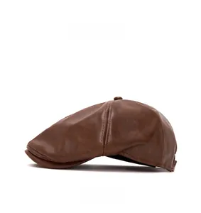 Side view of dark brown faux leather flat cap showing retro texture and fine stitching details
