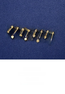 Detailed view of S925 sterling silver screw back stud earrings set in gold geometric shapes
