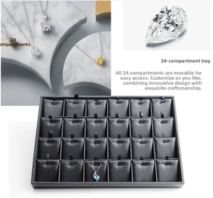 Detail of black PU leather jewelry tray with 24 removable slots for necklace display