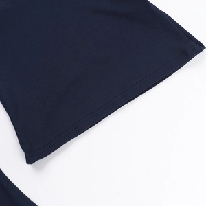Close-up of navy blue rib-knit fabric texture and double-stitch seam detail