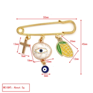 Technical size chart for gold safety pin brooch with evil eye and cross charms