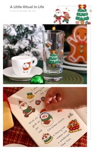 Macro detail of waterproof PET Christmas stickers on glass and ceramic surfaces