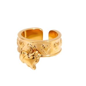 Detail of 18k gold-plated stainless steel ring with embossed hearts and hanging charm