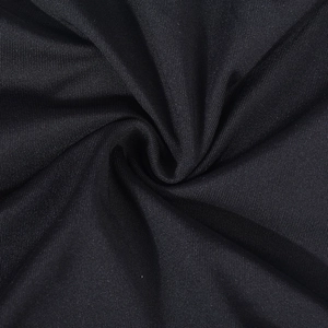 Close-up of black high-elastic knit fabric with elegant ruched texture and soft sheen