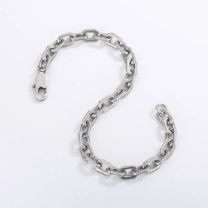 Detailed view of silver stainless steel cable chain bracelet with spring clasp closure