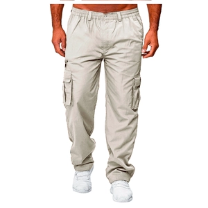 Detail of light khaki cargo pants featuring large side flap pockets and reinforced stitching