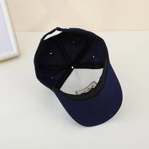 Inside view of navy blue kids excavator baseball cap with reinforced inner seams and liner