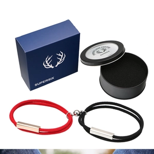 Matching magnetic couple bracelets in red and black with premium gift box packaging
