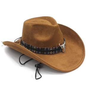 Detail of brown faux suede cowboy hat featuring a silver bull head pendant and woven band
