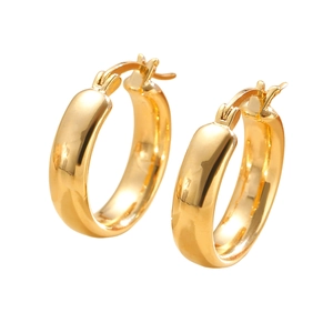 Minimalist wide golden hoop earrings with high-polish mirror finish and secure clasp