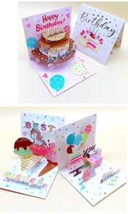 Detailed views of handmade 3D pop-up birthday cards with unicorn and cake designs