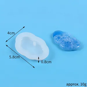 Detailed cloud-shaped silicone mold with size dimensions and blue resin finished product