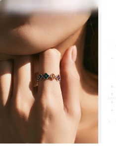 Detailed view of 925 silver four-leaf clover ring with multi-color candy enamel modules