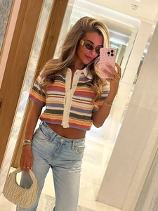 Cropped crochet polo top with vibrant multi-color stripes and button-down design