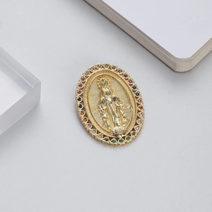 Detail of 14K gold plated Virgin Mary pendant with colorful zircon stones on oval edge