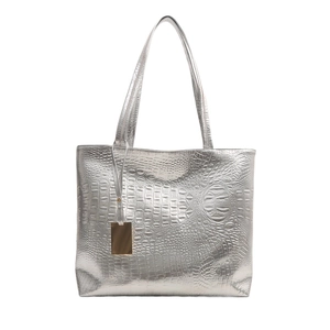 Silver crocodile embossed large tote bag with metallic finish and dual straps on white background