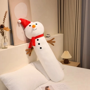 Plush snowman body pillow detail showing soft fabric with red scarf and carrot nose