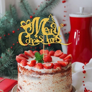 Golden glitter Merry Christmas cake topper with festive strawberry cake decoration